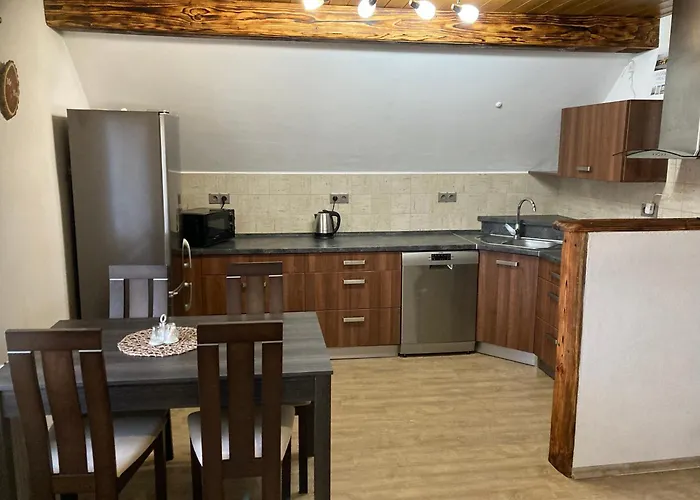 V Podkrovi